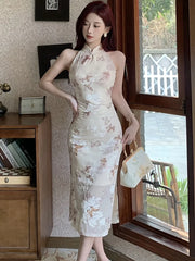 A woman wearing an elegant floral maxi dress with a flattering fit and a chic Korean-inspired style.