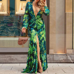 A woman wearing an elegant floral maxi dress with a flowing silhouette and a flattering fit.