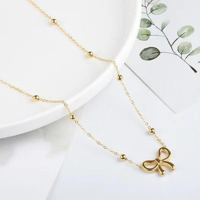 L-316 Stainless Steel Beads Chain Hollow Bowknot Pendant Necklace for Women 2